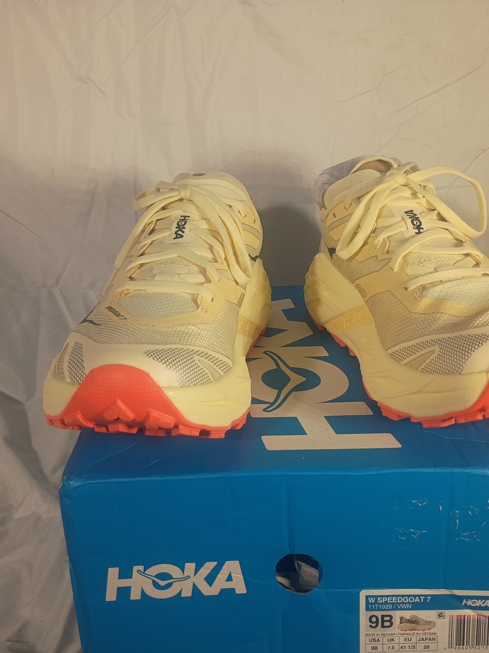 HOKA Speedgoat 7 Trail Shoes in Pale Yellow with Coral Accents